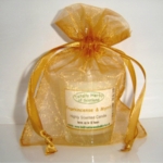  Frankincense and myrrh candle in a red gift bag